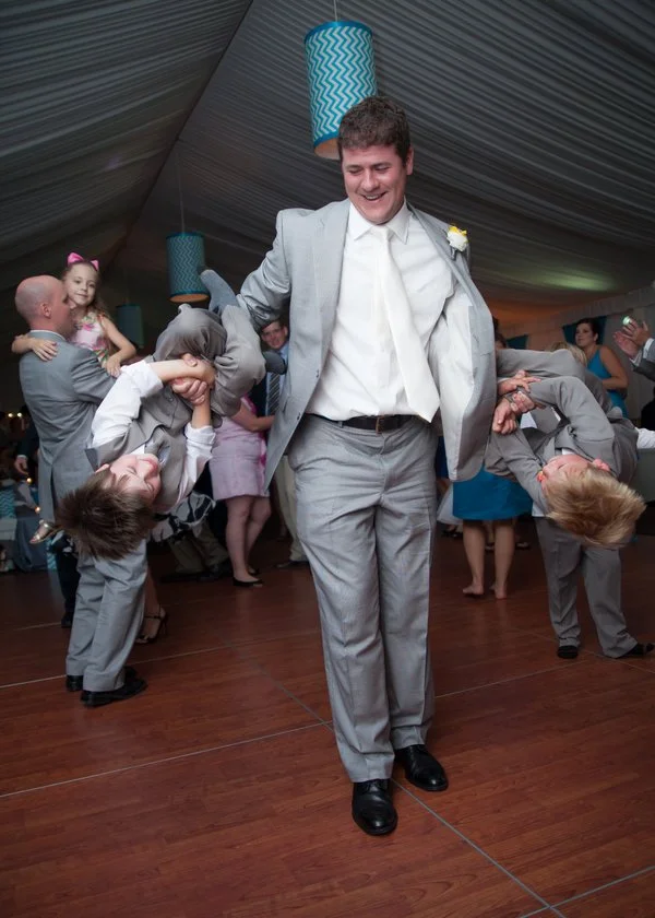 groom-dancing-ring-bearers.jpg