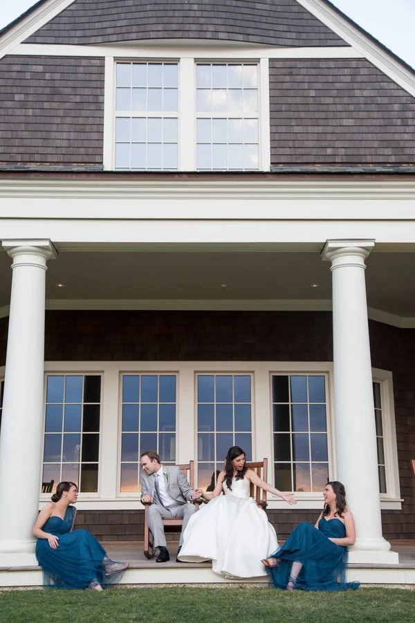 bride-groom-sisters-porch-sitting.jpg