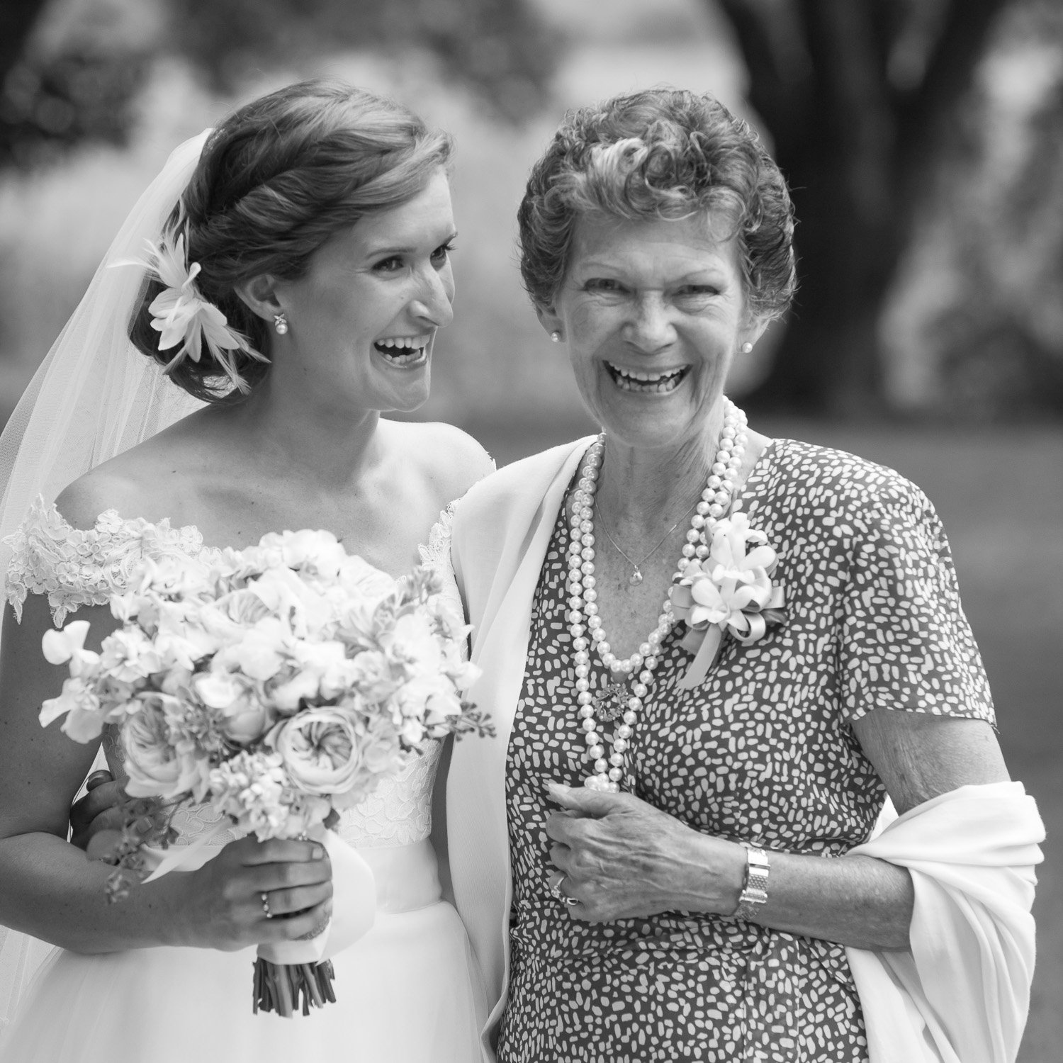 candid black and white of bride and her grand-mother
