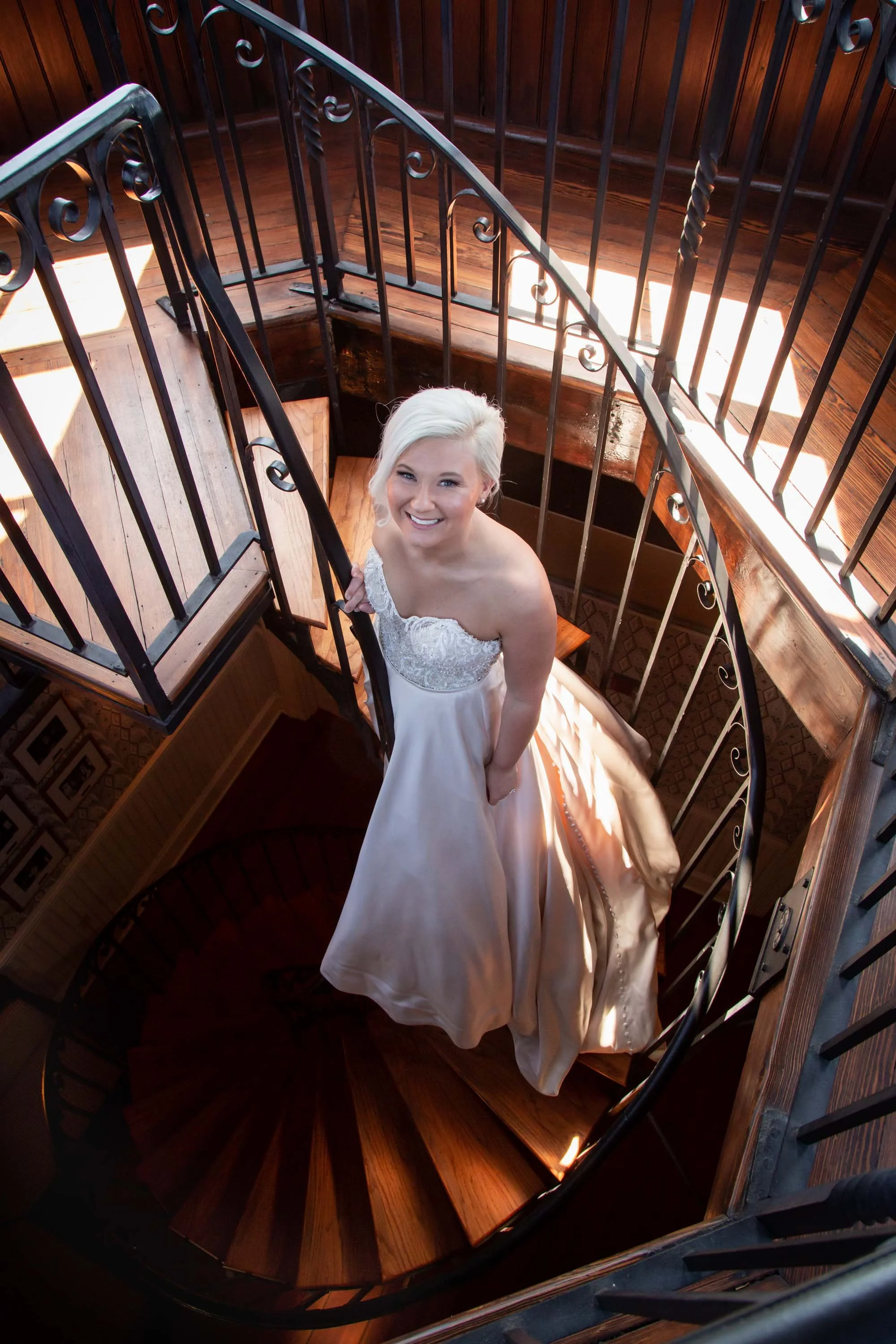 bride on Wentworth Mansion staircase