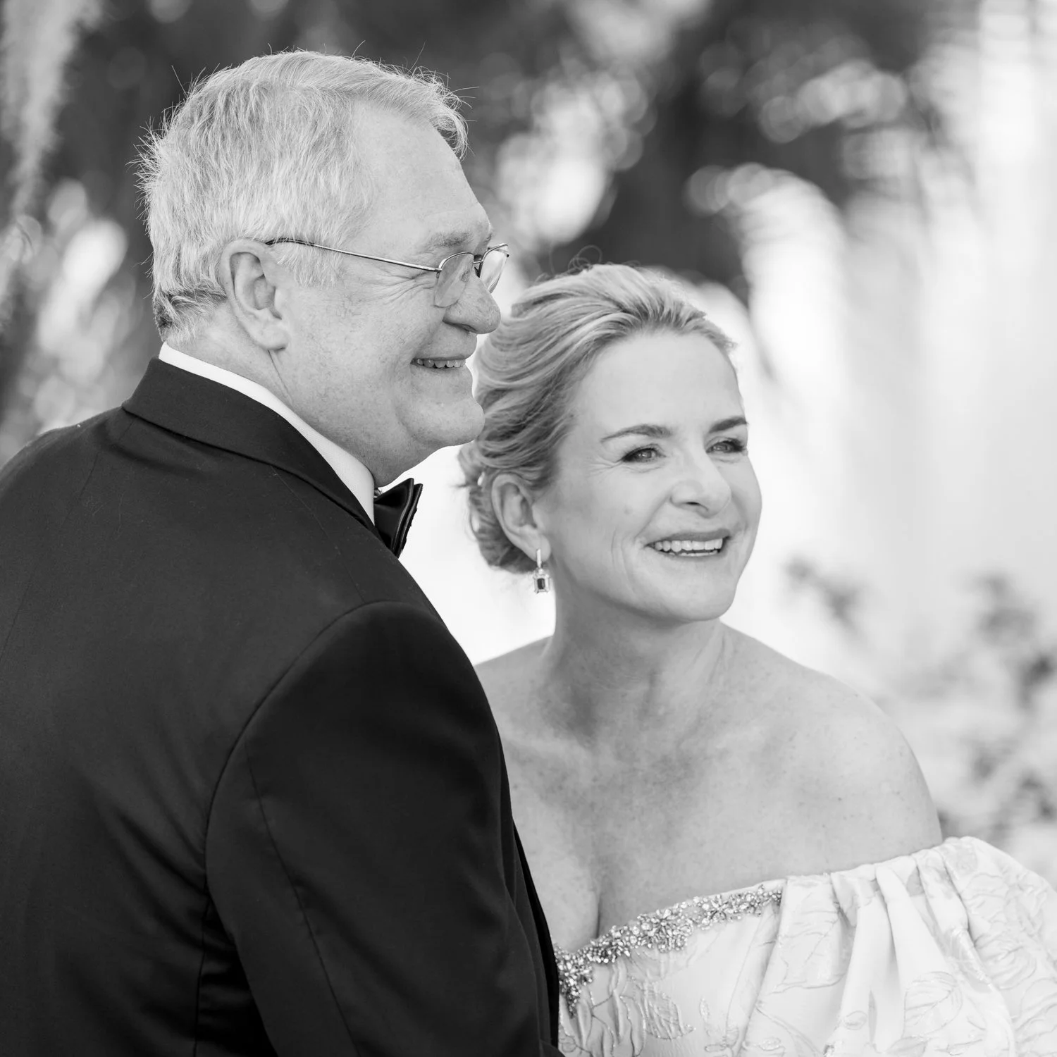 black and white candid of wedding couple