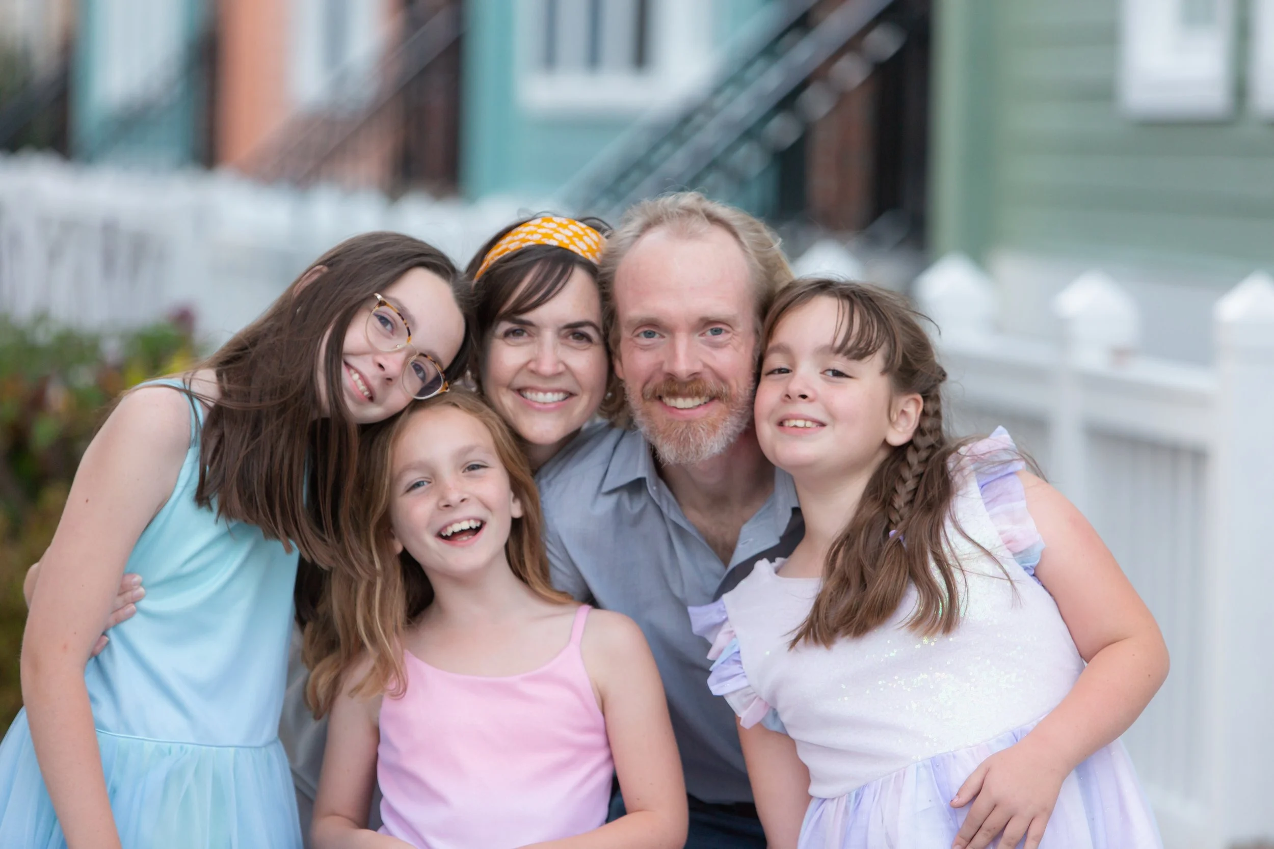 faces and smiles of girl parents family portrait