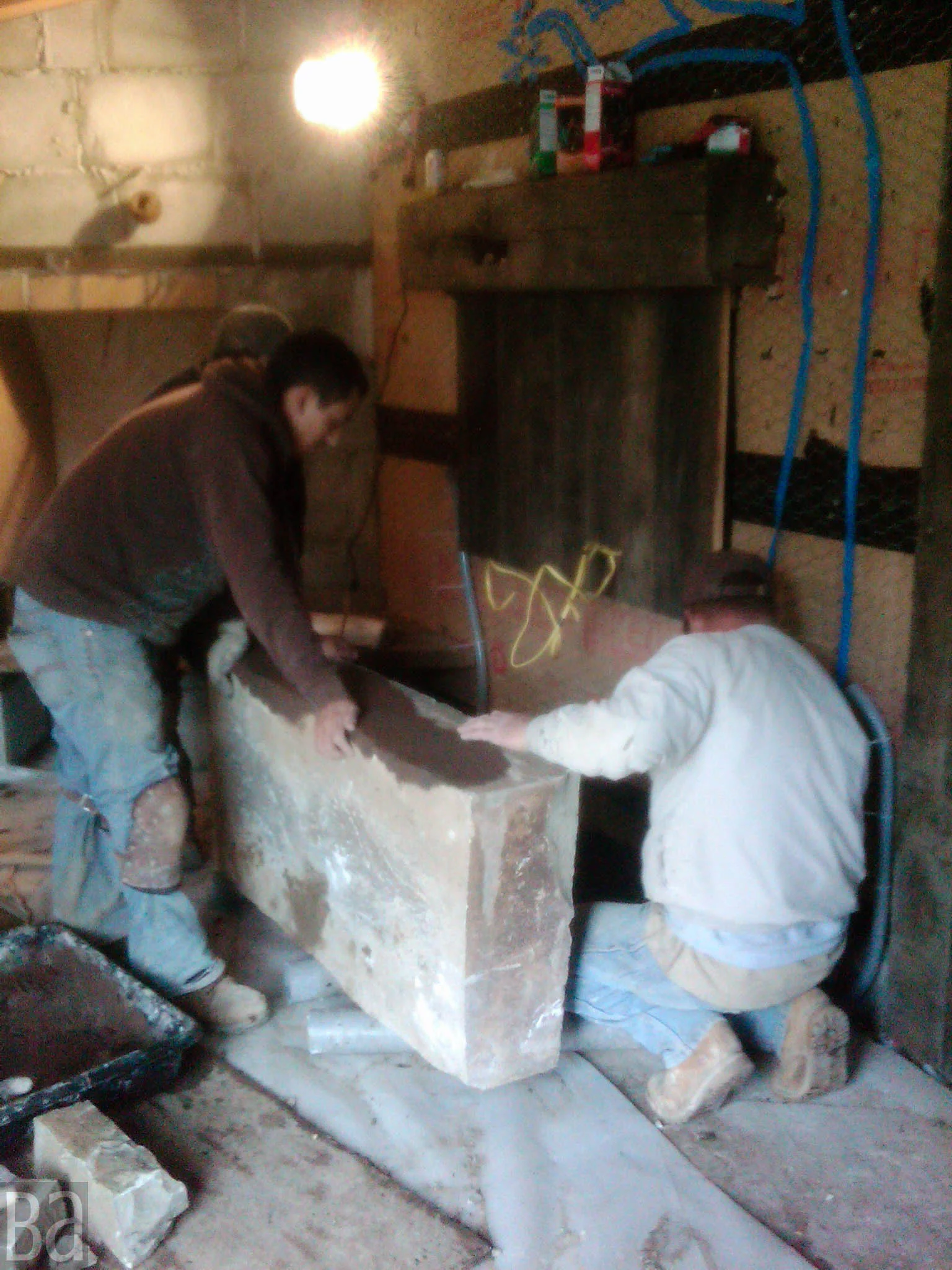 Moving a big rock into place
