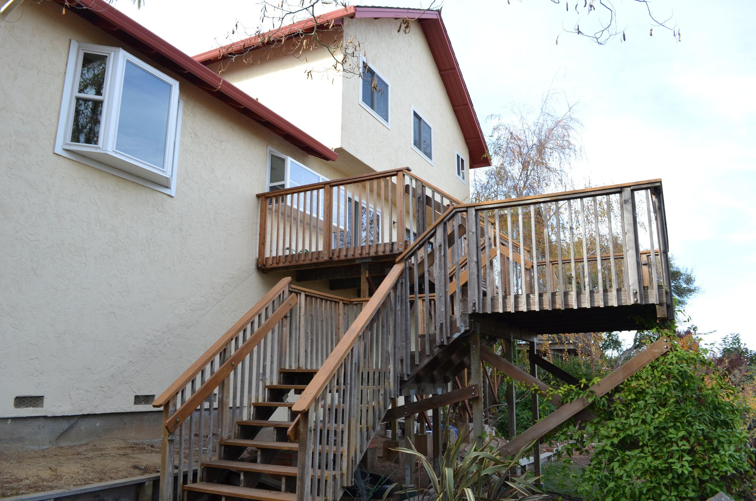 The deck and rear of the existing house.