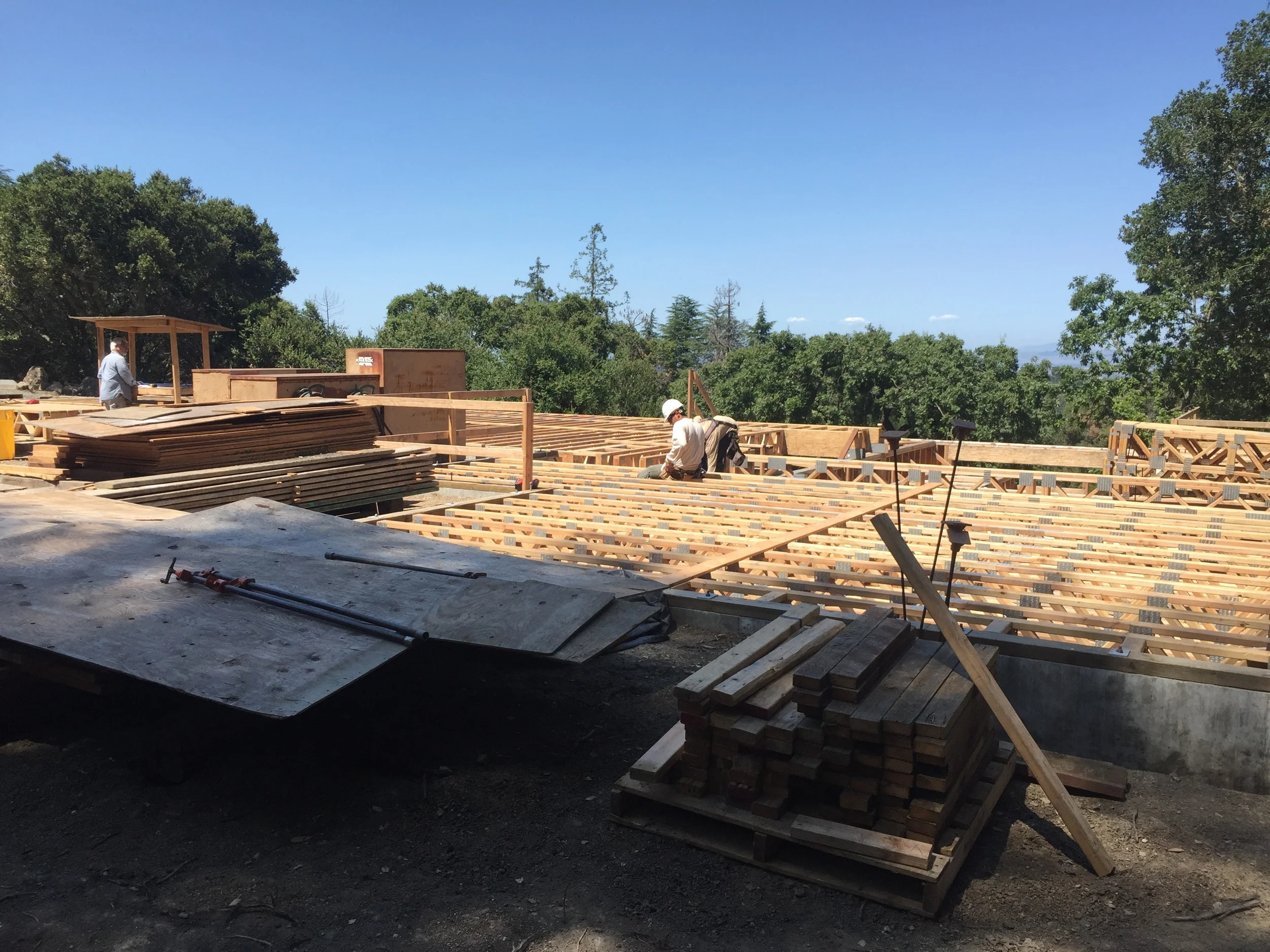 The lower level looks out across the hillside and trees but the upper main level will have a view of the Bay.