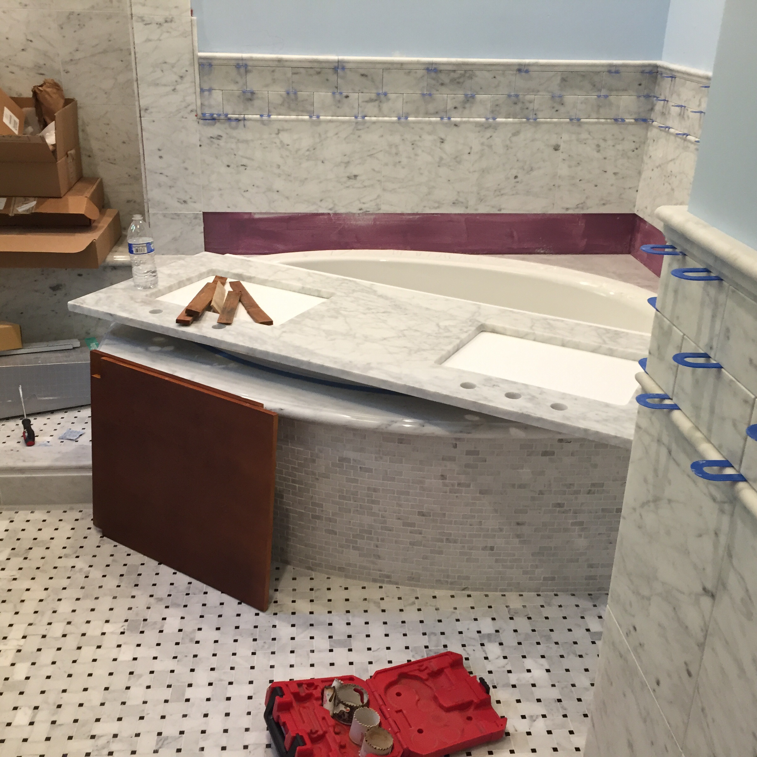 What was a dark alcove tub and shower is now open and light. 