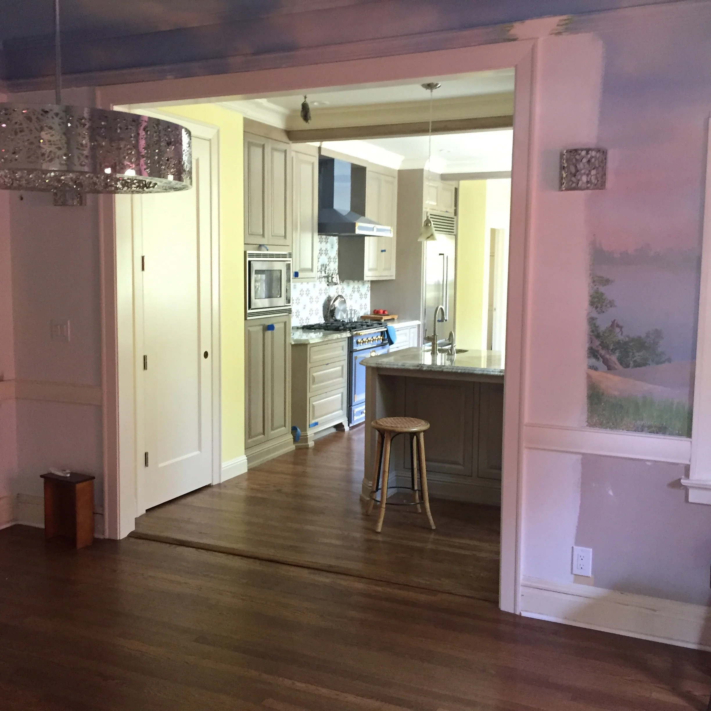 This view from the existing Dining Room to the new Kitchen is an amazing transformation from the old dark hallway.