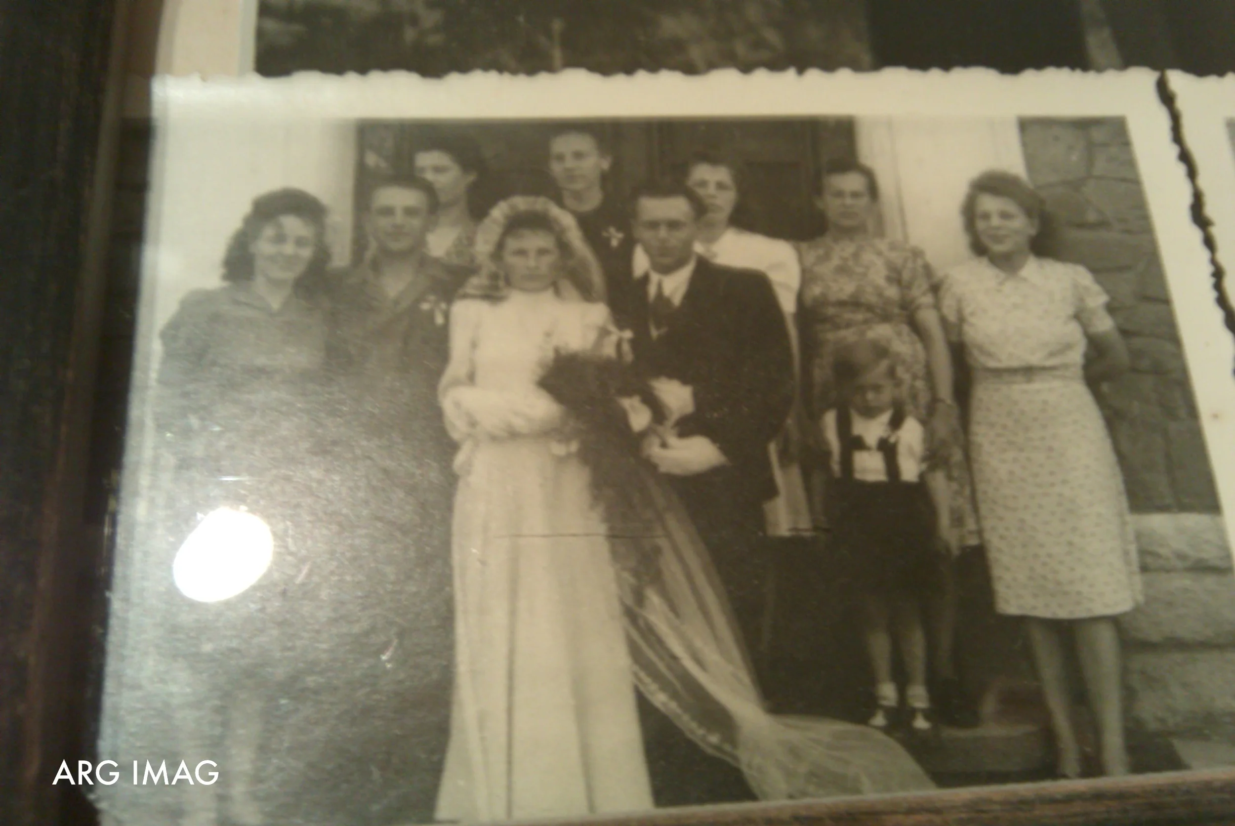 (She had very few images of her wedding to my grandfather except the ones hanging on her bedroom wall. I snapped a few with the phone I had at the time)