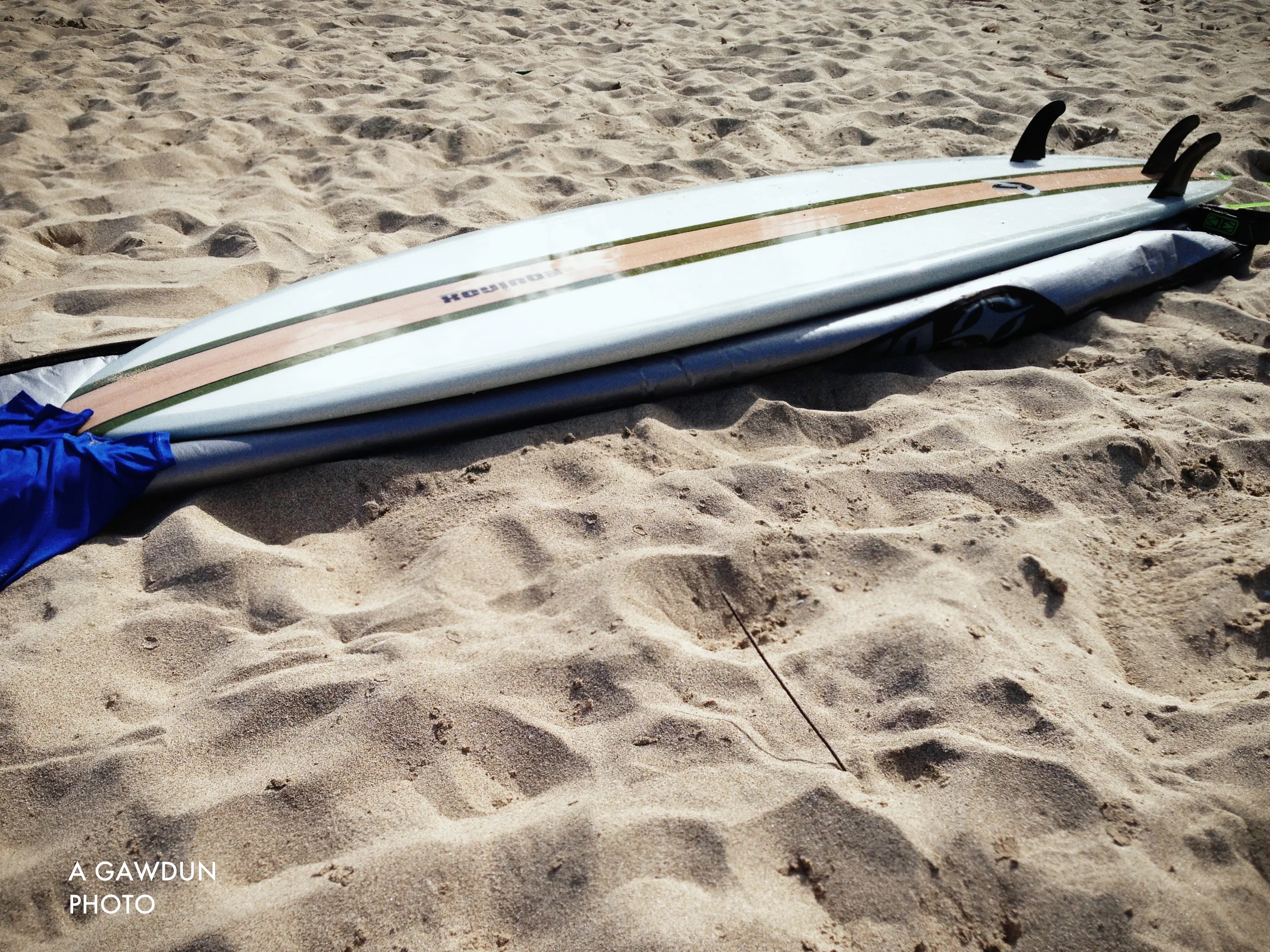 I have realized there are a good amount of images of my surf board or me carrying it but not one of me using it. Being a photographer sometimes means you forget to have your photo taken. Guess I'll just have to go back to Kauai and have photos of me surfing. DARN :)