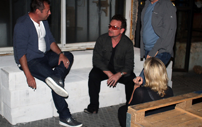Bono's Edun clothing line boosts percentage of clothes made in Africa
