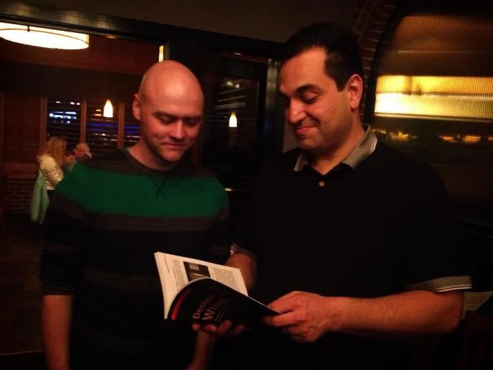 Me and Tolga discussing my book