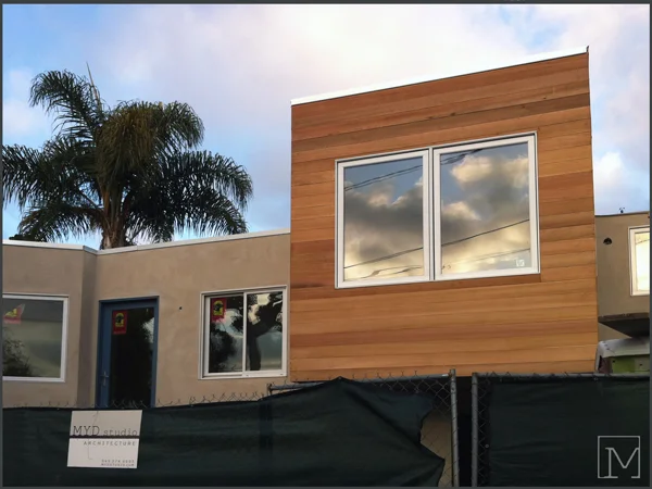 stucco + siding (unfinished)