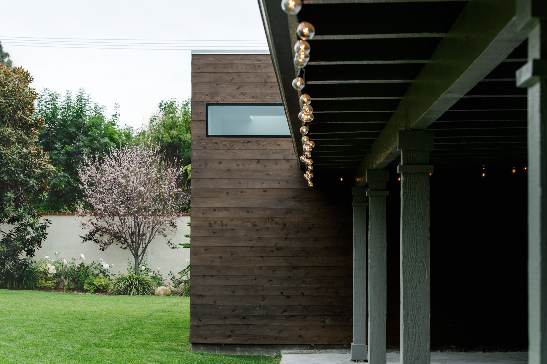 cedar-clad addition at rear