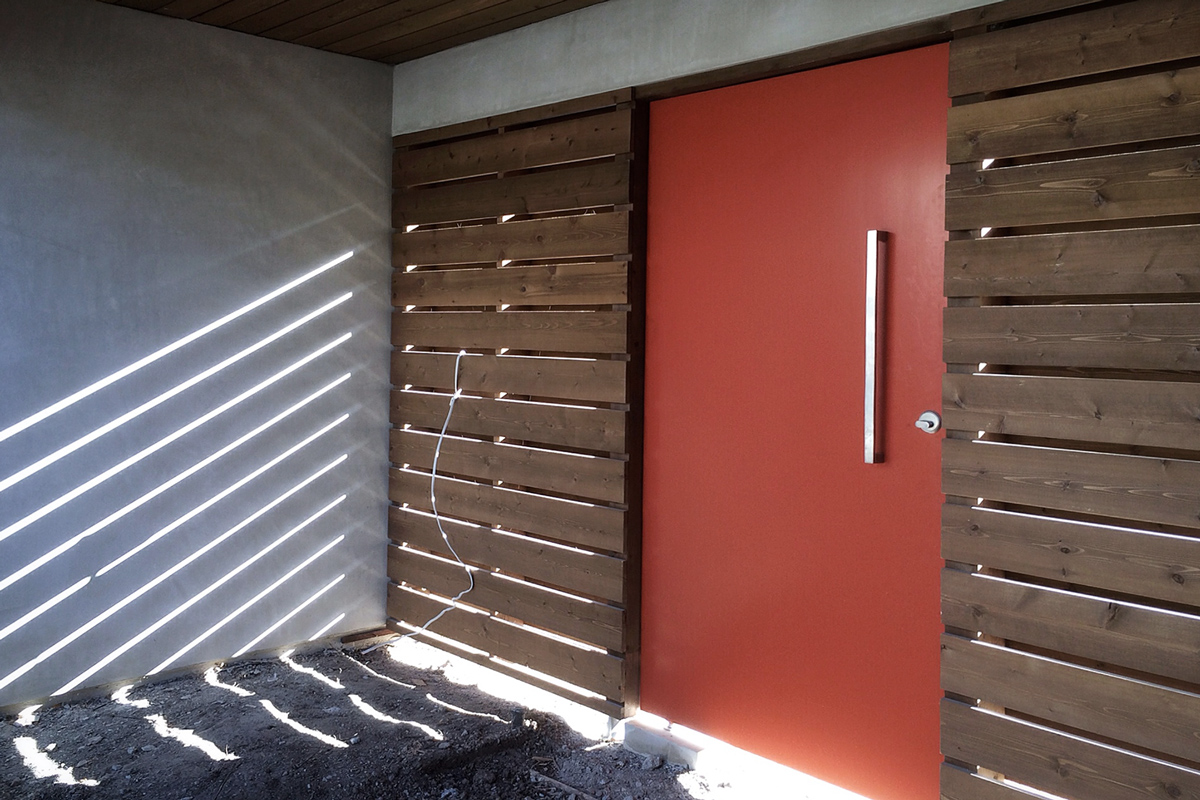 orange pivot gate / entry courtyard