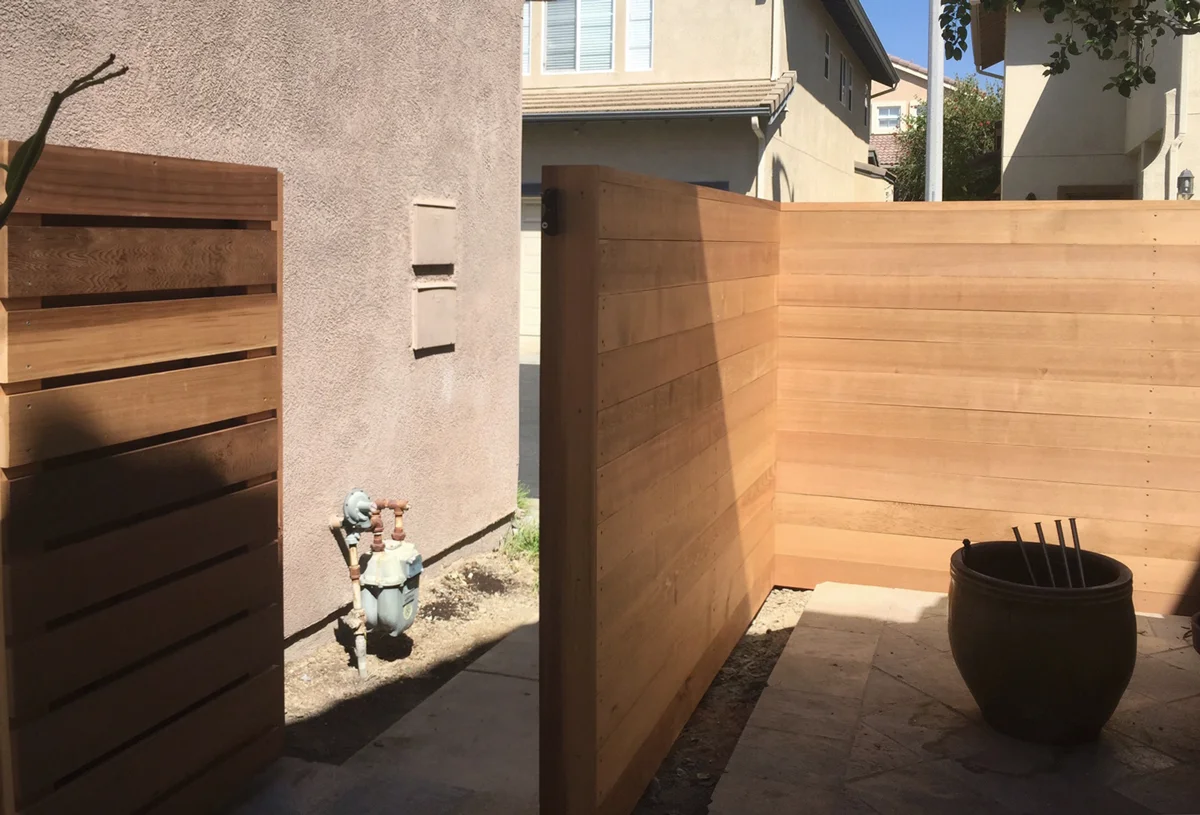 double-sided fence at exterior kitchen location