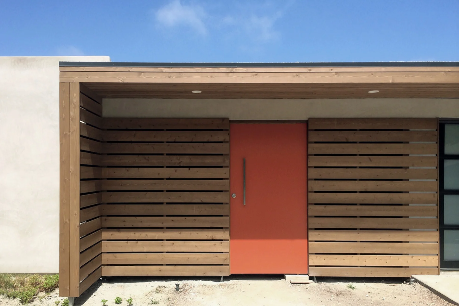 midcentury modern remodel / exterior slatwall courtyard enclosur