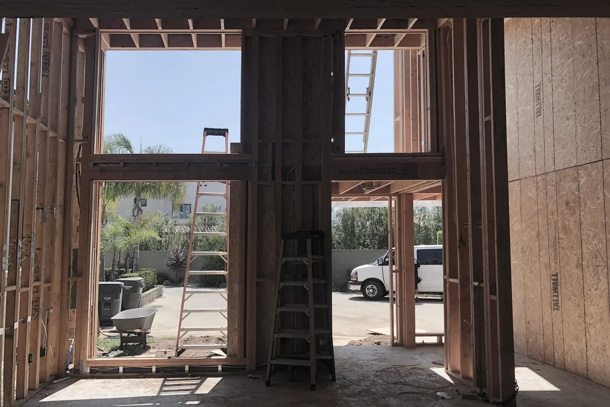 modern addition at entry / under construction in huntington beac