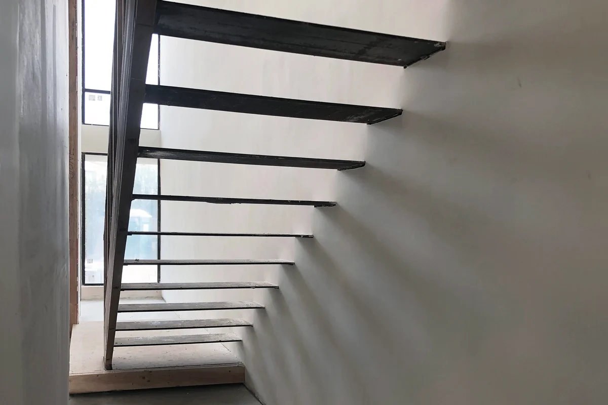 floating stair steel treads - under construction in huntington b