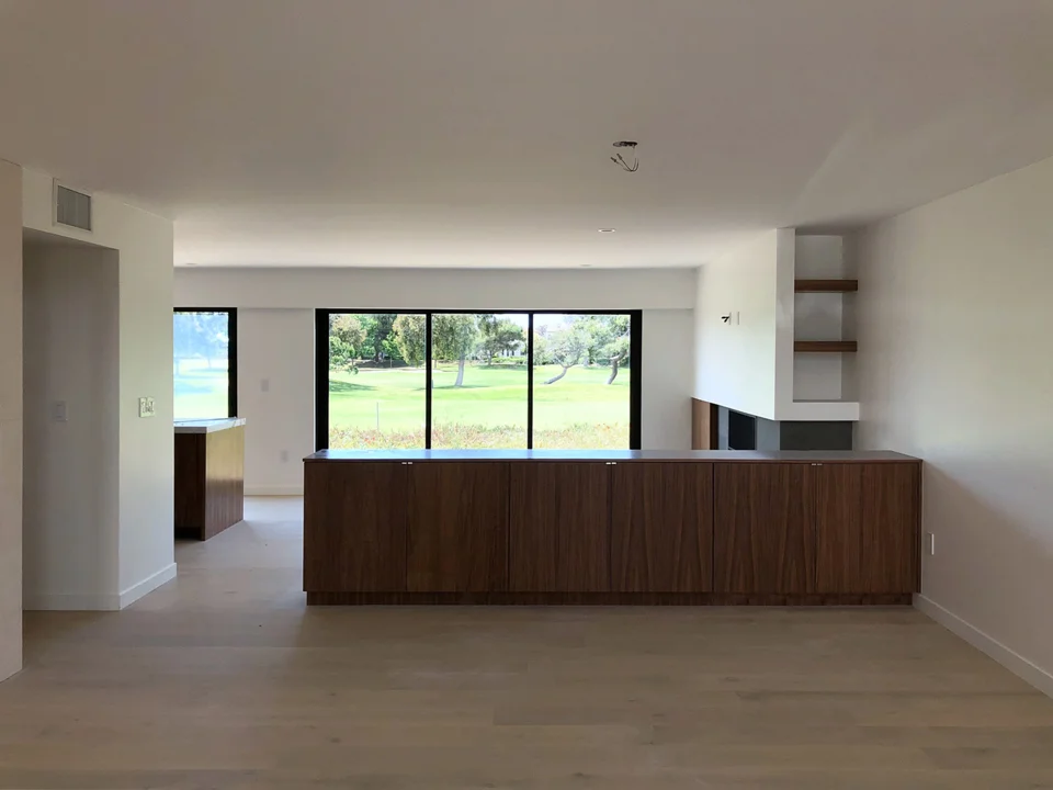 built-in cabinetry at open dining room / view from entry