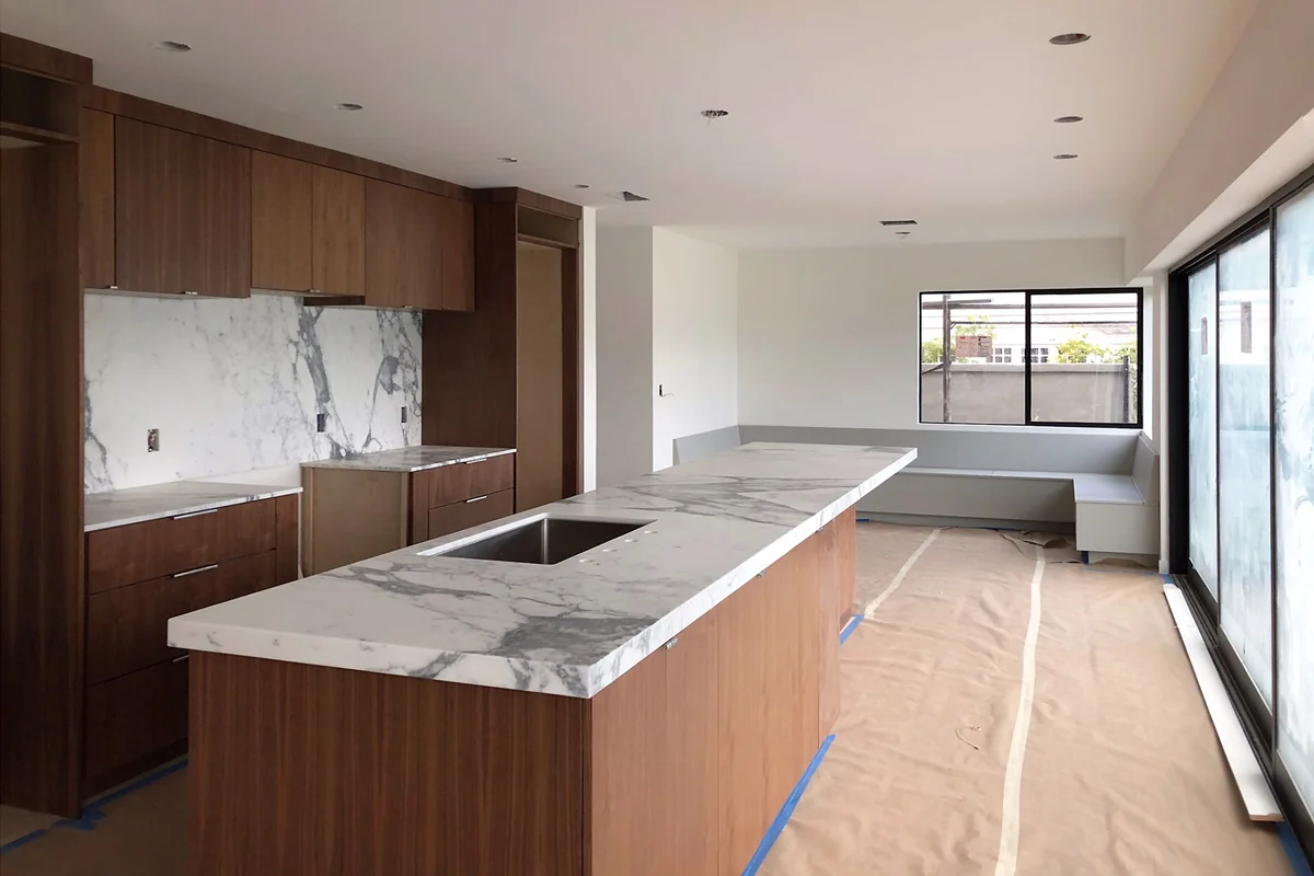 open kitchen at built-in nook - huntington beach modern home