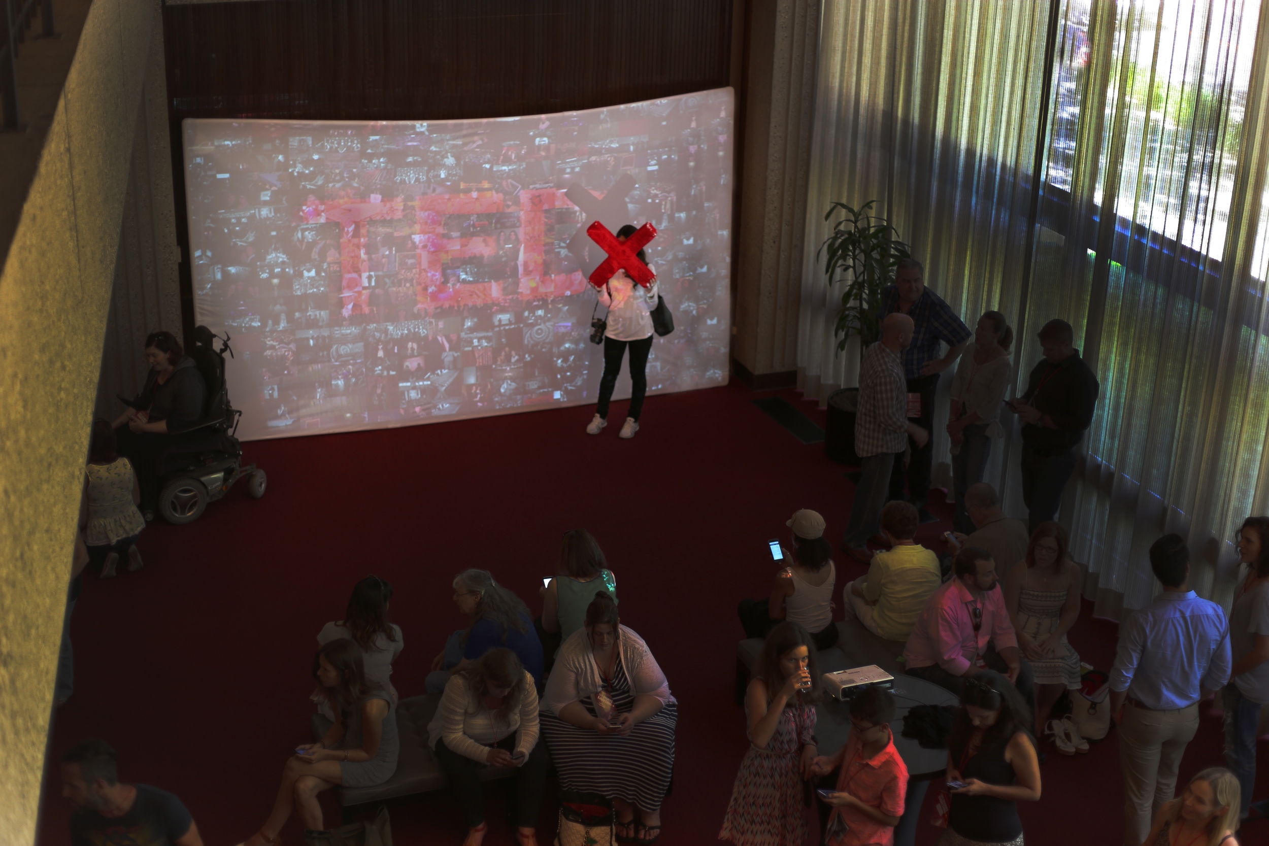 TEDxSacramento conference attendees in front of an art installation - one of the many activities designed for the occasion. Thank you to Phil America, Dorian Lynde and Lauren Herman for their collaboration on this installation. Photo: Phil America.