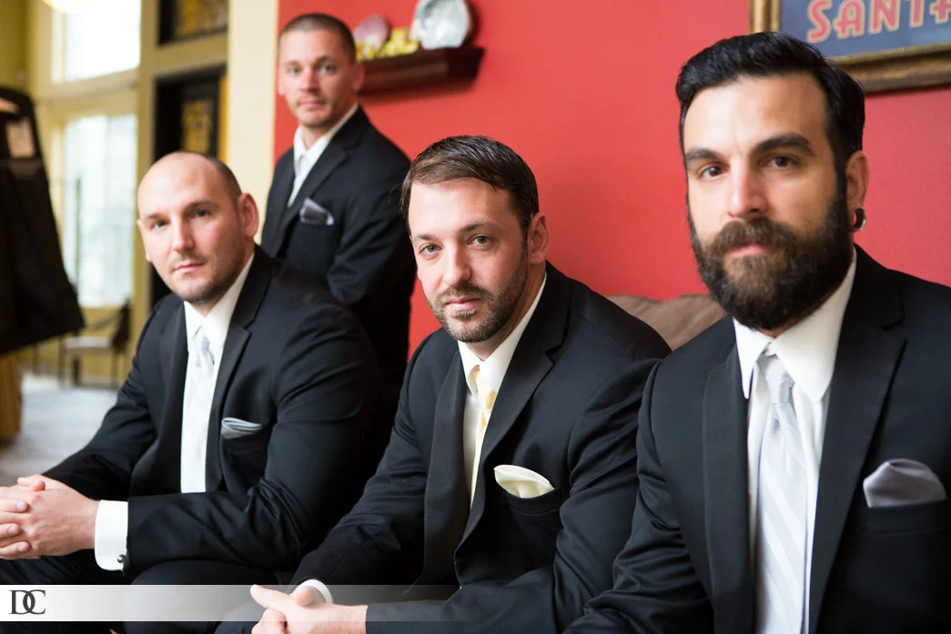 Patrick surrounded by his men, looking tough and sharp.