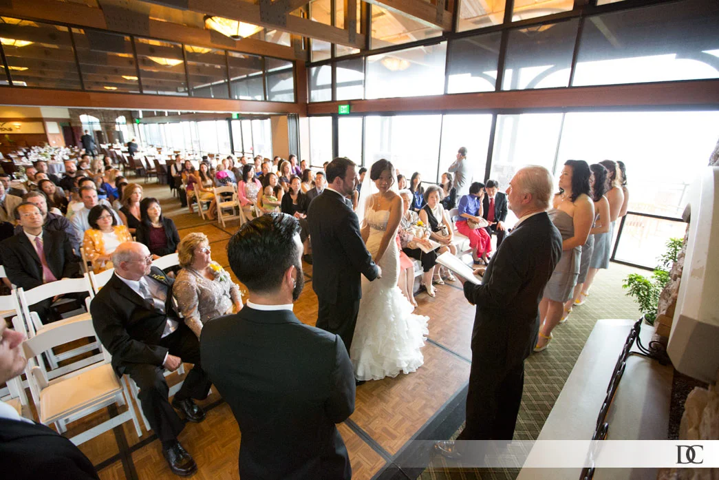 Due to the rain, the ceremony was held in the light-bathed restaurant at the Crossings at Carlsbad golf resort.