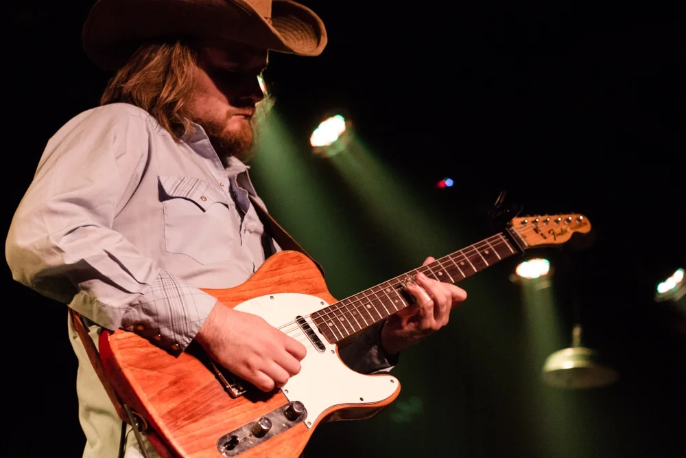 Guitarist Laur Joamets earning his choice of headwear