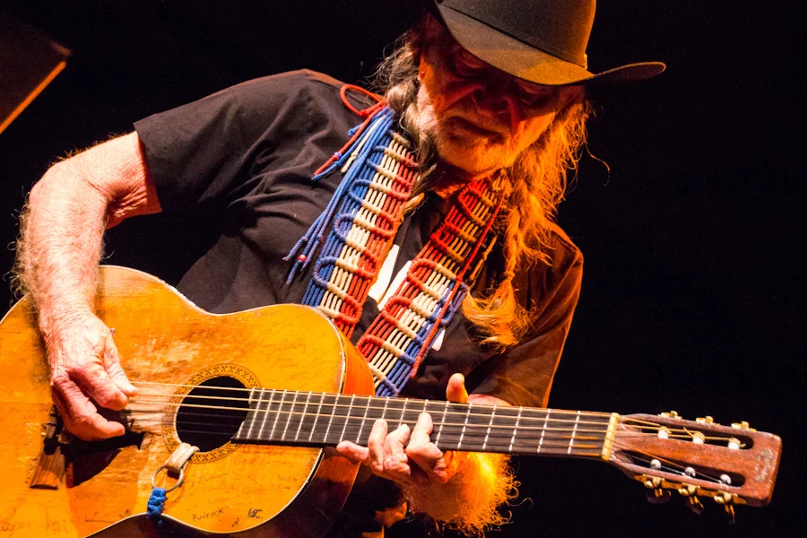 100% legend. Willie Nelson performing at a packed-to-the-gills sold out 9:30 Club in Washington, DC - 5/7/12 (photo by Kevin Hill)