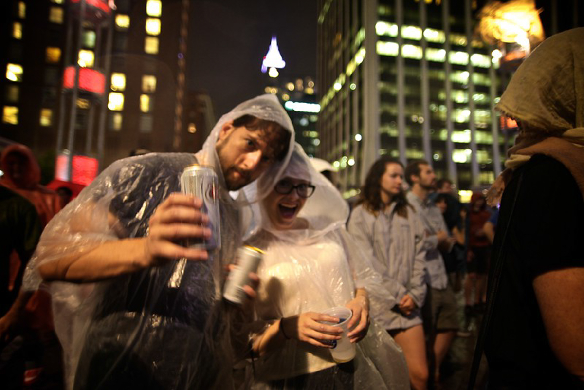 GS!YBE fans The last summer storm of the year threatened to cancel but only enhanced the Godspeed You! Black Emperor set at City Plaza. (Photo by PJ Sykes | www.pjsykes.com )