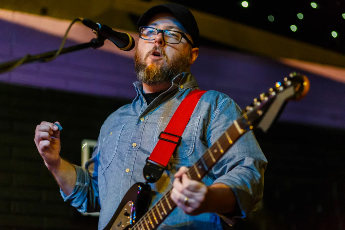 Hey! We know that guy! Hoax Hunter/Photographer PJ Sykes pulling double duty at a day show at Legends Nightclub during Hopscotch 2015 (photo by Matt Condon)