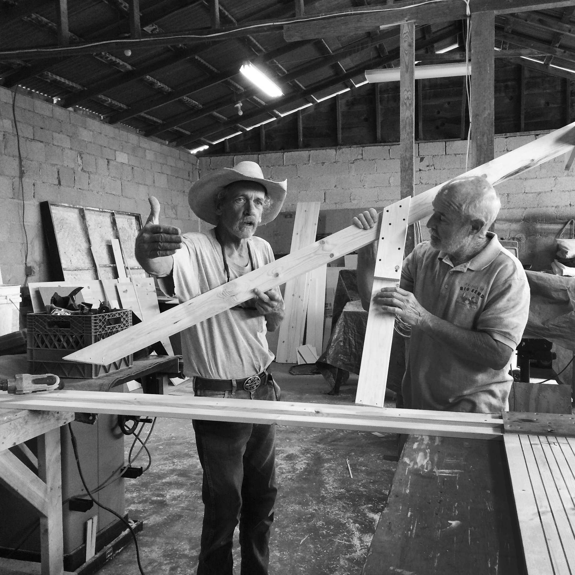 Matt Campbell, Alpine’s resident master set builder and 2nd unit producer Mike McShane go over assembly details for the pine frame used for DJ’s portrait. The ten foot high frame was designed to match the proportions of Texas Monthly, of which DJ was the art director for more than 15 years before joining Pentagram.