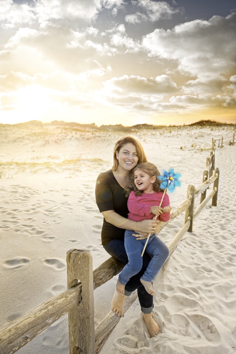 Mother and daughter at sunset. Photographing young children with their mothers is often more challenging than photographing a child by themselves. My favorite photo came moments before sunset and was one of the last shots out of hundreds.