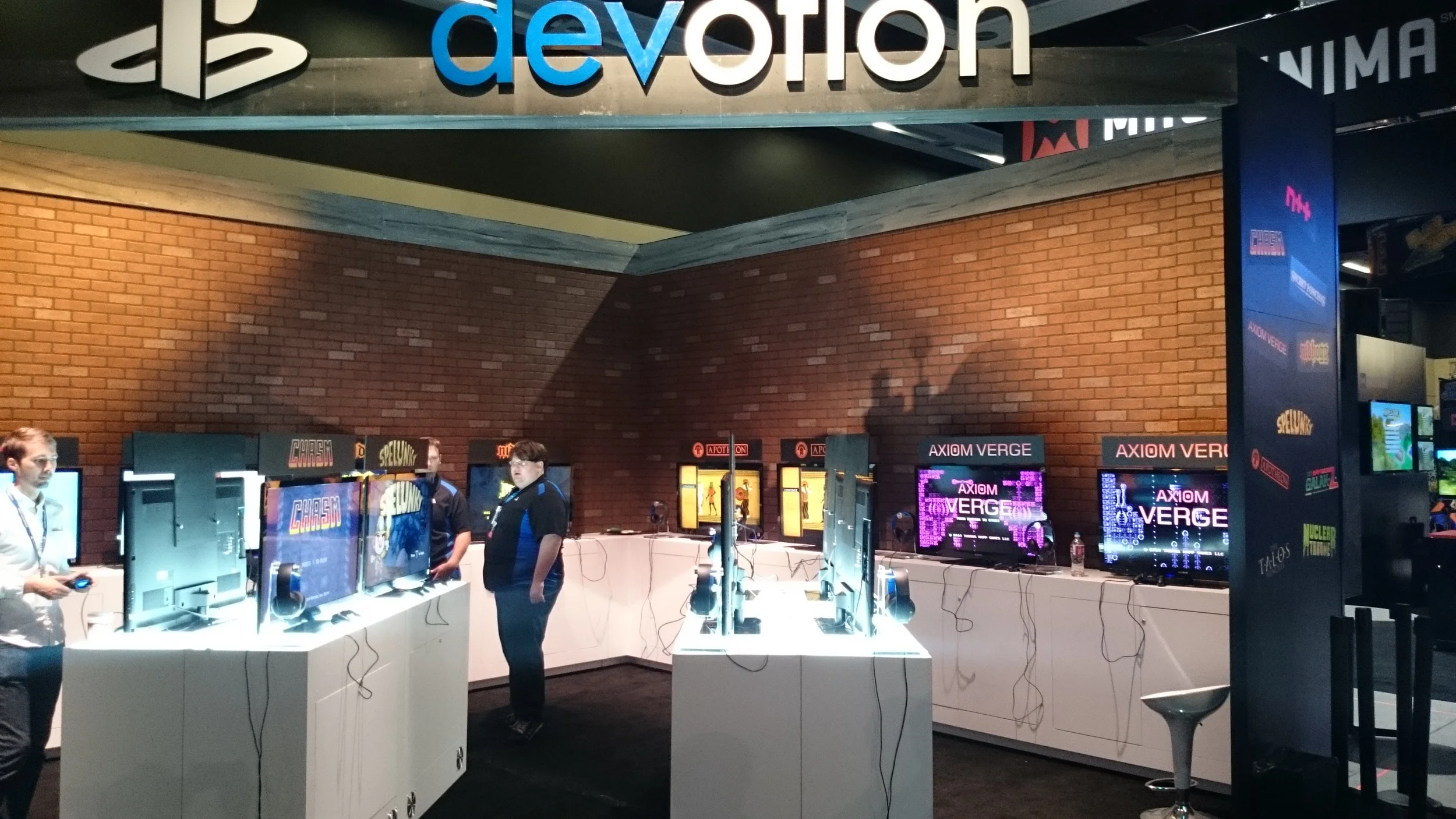 Here's the Sony booth. The layout was a bit awkward this time, but it didn't seem to keep a steady stream of players from squeezing in. You can see Matt Bodega helping to set up.