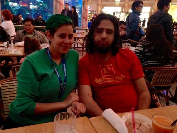 Maya and very sleepy Rami Ismail at Cheesecake factory. &nbsp;Rami had just taken a 30 hour flight from Taipai and was in need of nourishment.