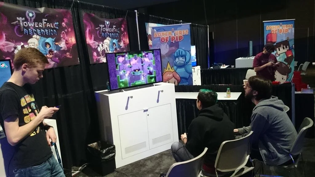 Maya taking a break from manning the Close Castles booth to play some TowerFall.