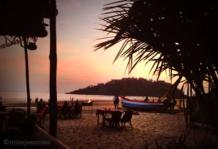 Hauling in a boat after a day at sea, sunset view from my favorite hangout on Palolem beach