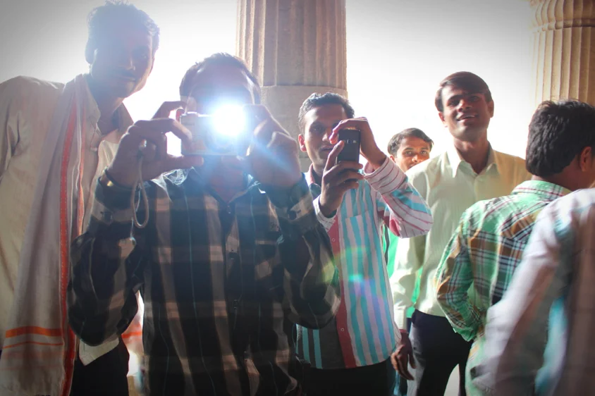 Locals taking pictures of me taking pictures, paparazzi style. 