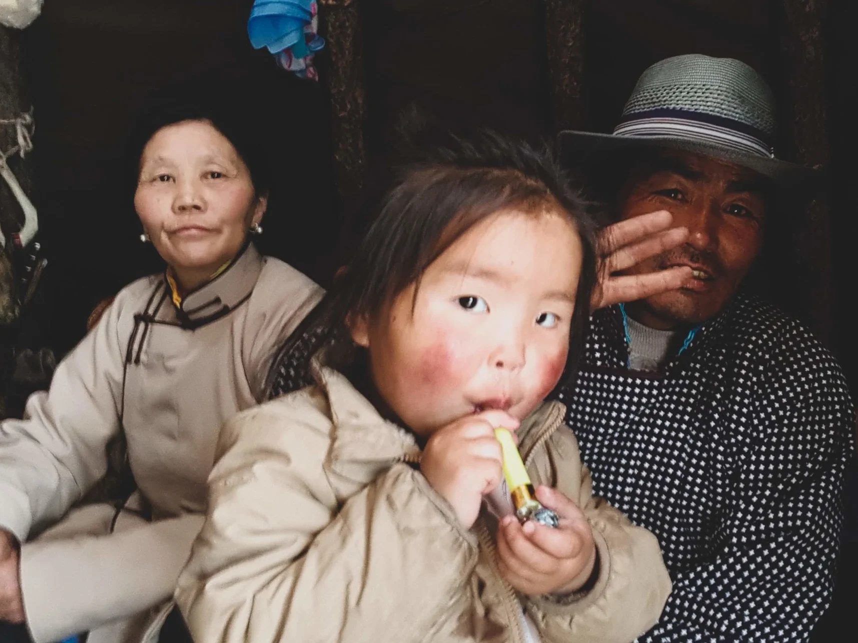 Otgoo, their granddaughter and Zorigt in May 2018.