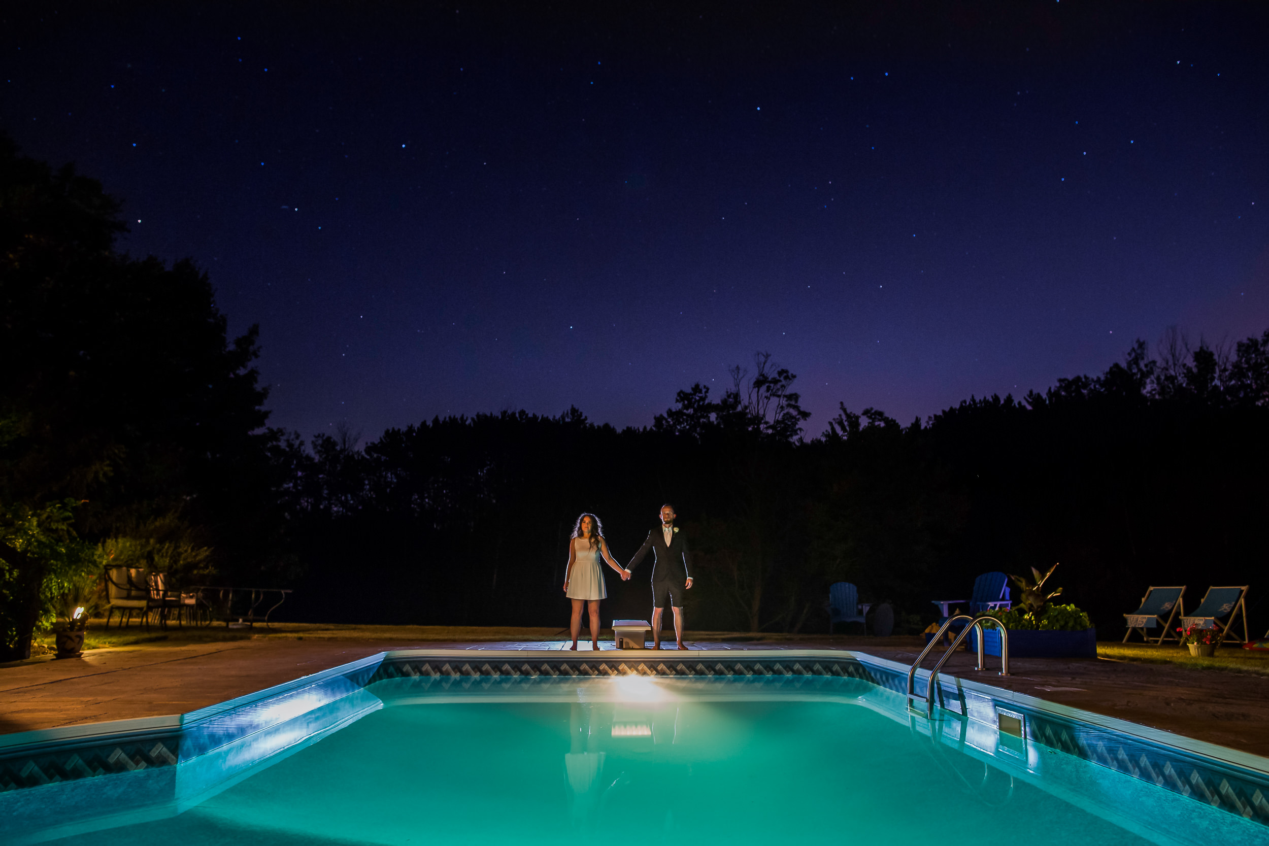 Night time photography - Canadian wedding - swimming pool at a wedding