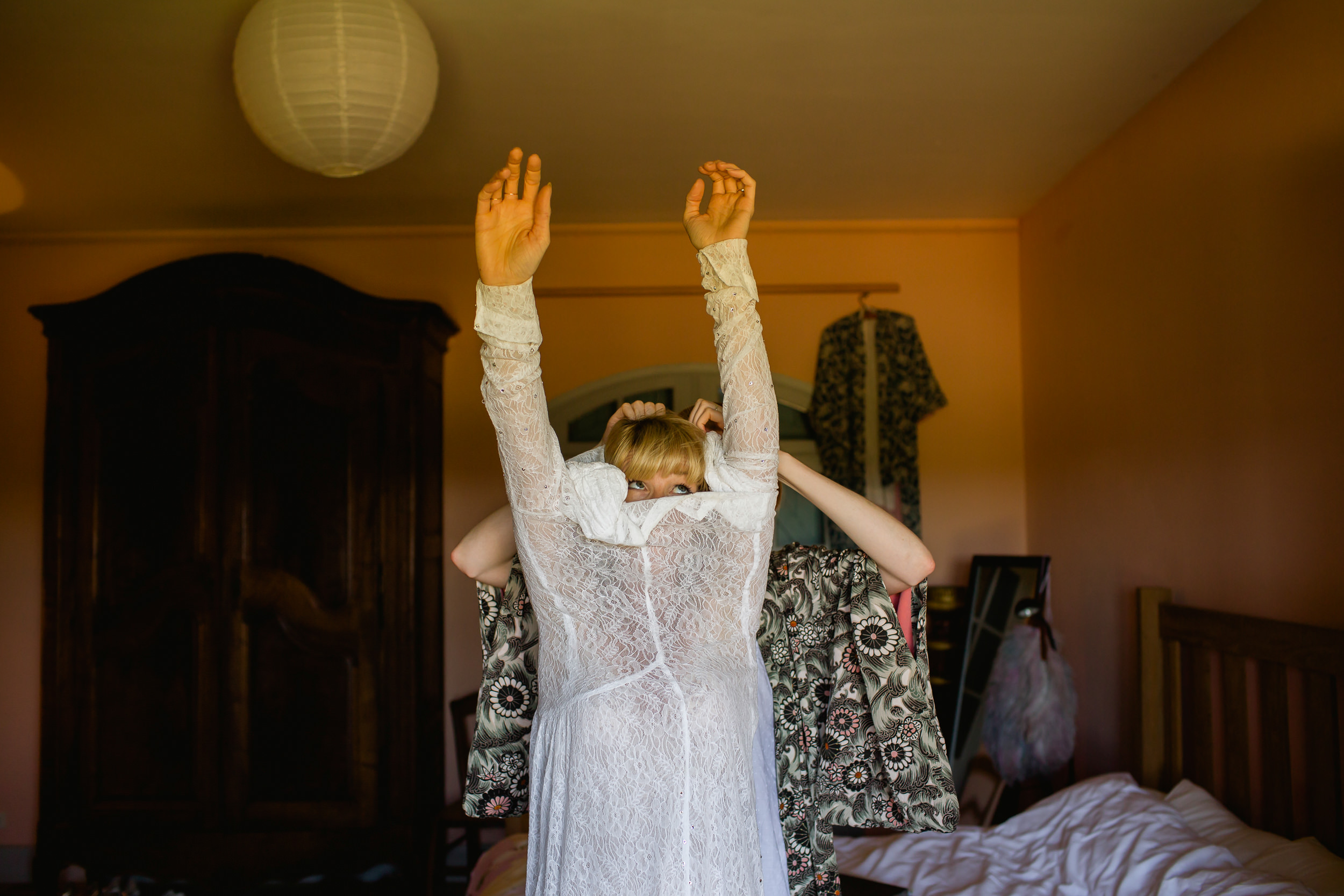 A bride dresses in a vintage dress - south of France wedding - weddings at Castelnau Des Fieumarcon