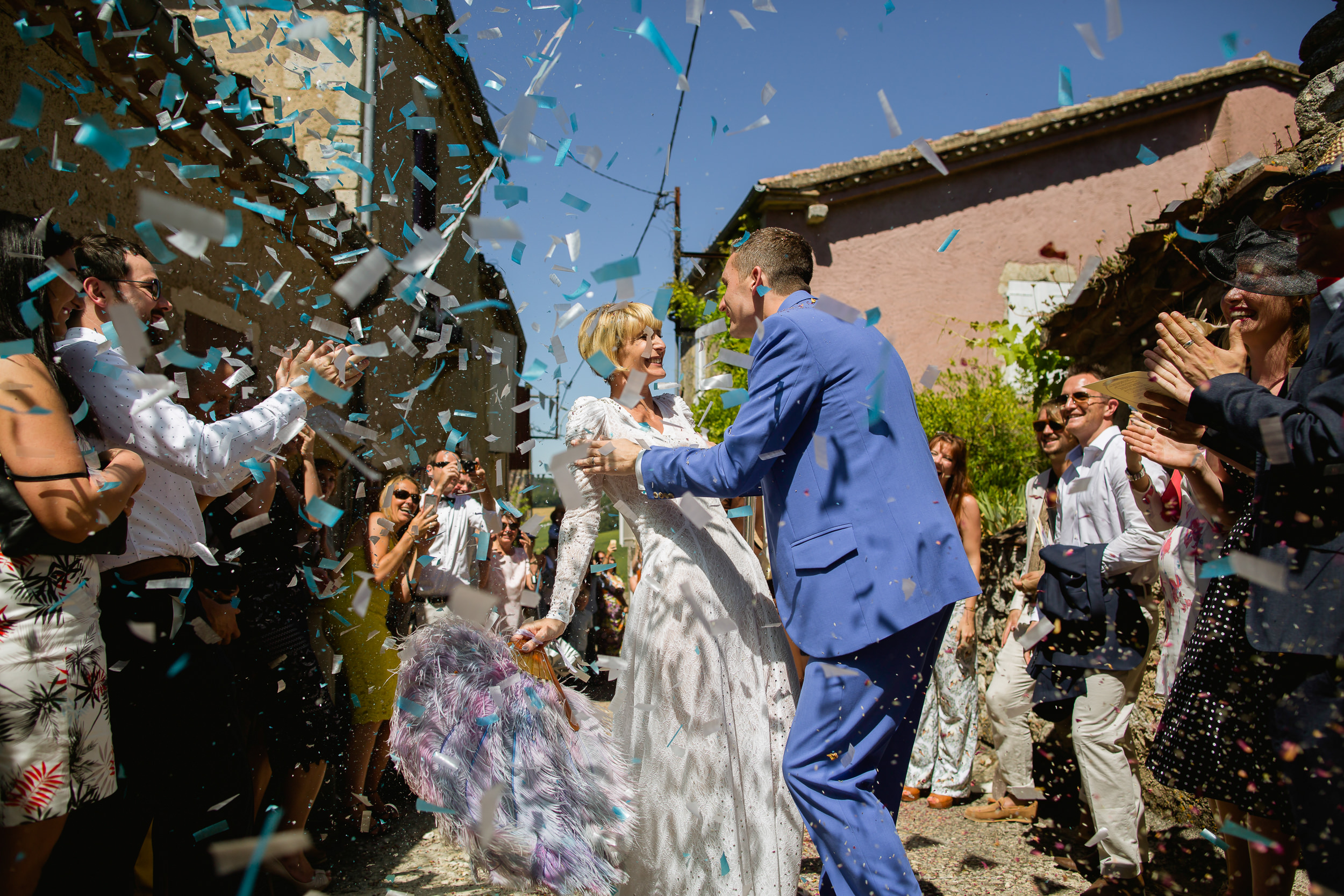 confetti at a wedding - confetti at Castelnau Des Fieumarcon - French wedding photography
