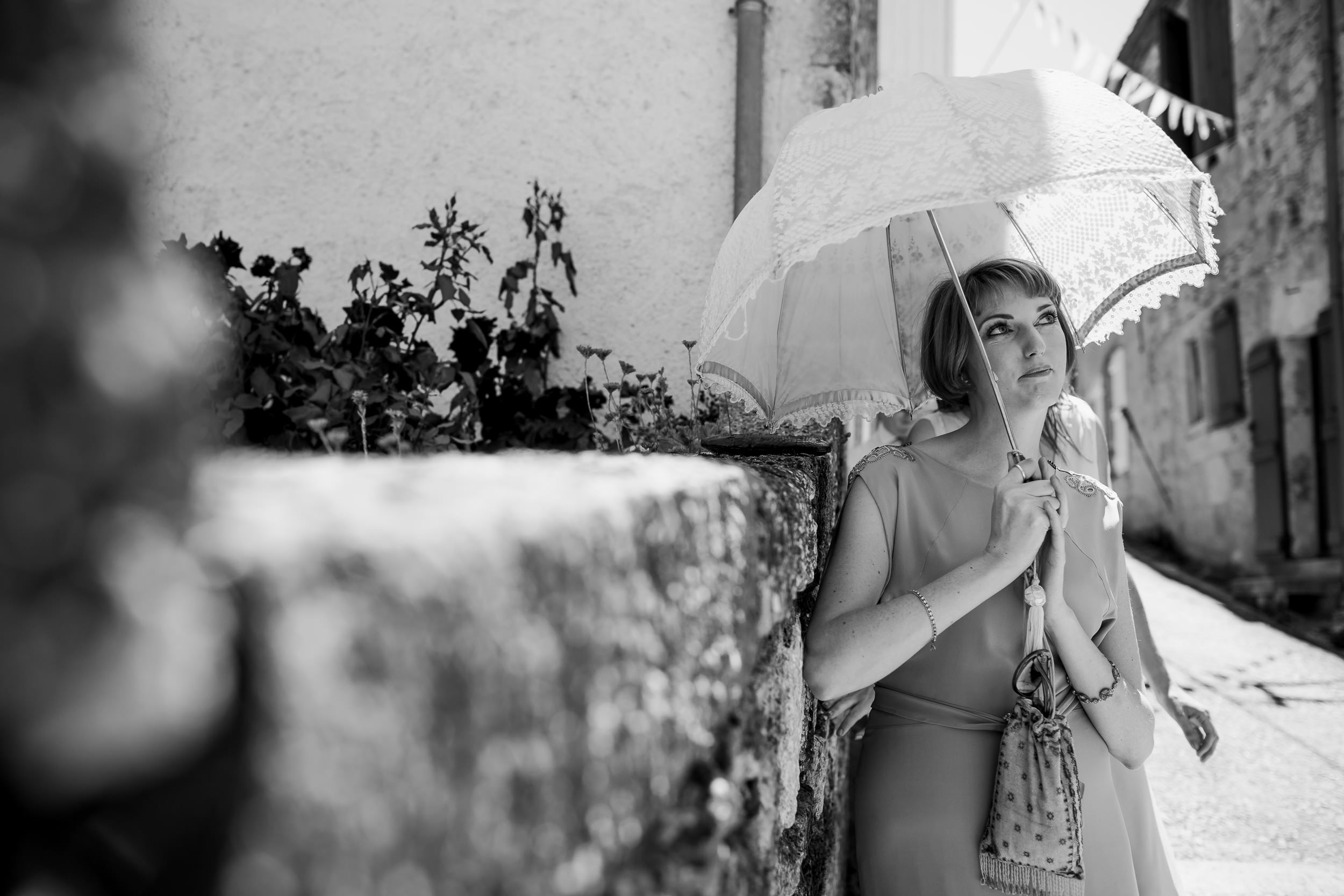 A bridesmaid - Bridesmaid with umbrella - wedding at Castelnau Des Fieumarcon