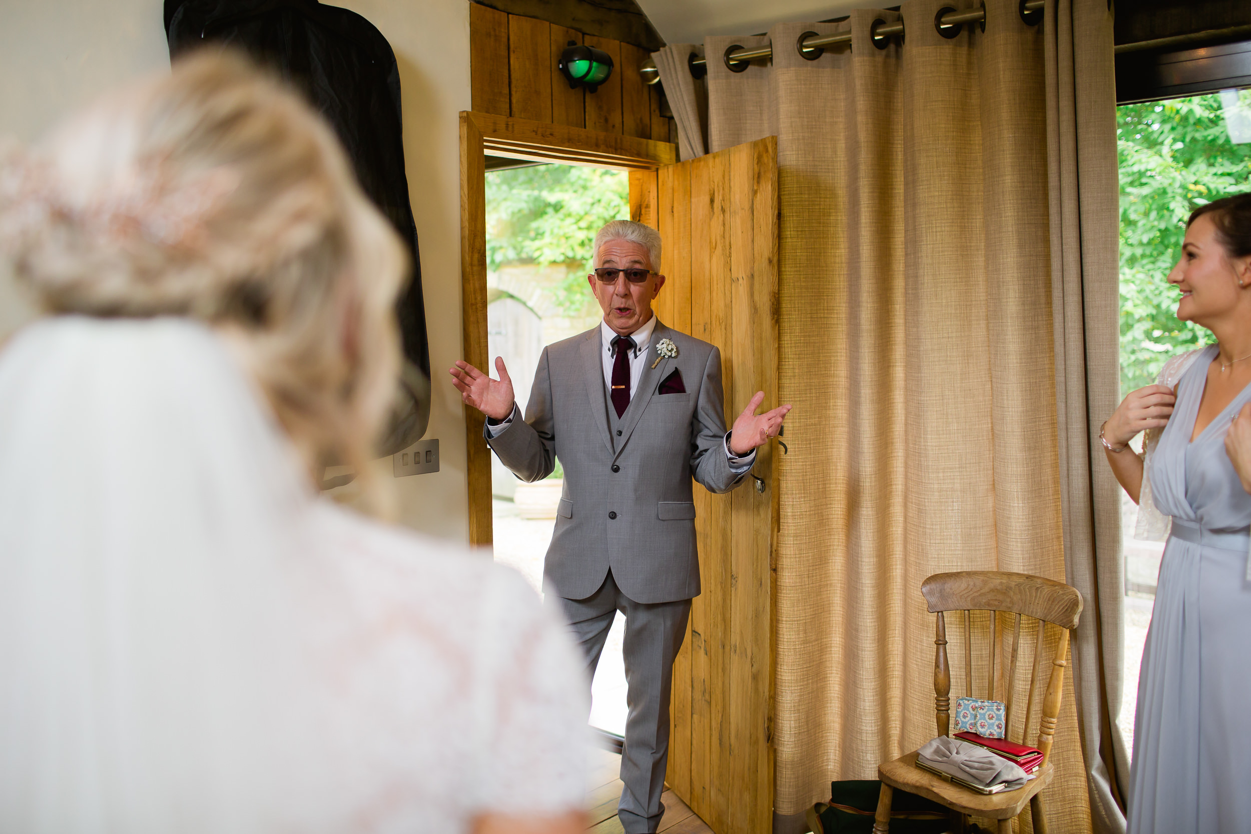 Fathers first look at his daughter on her wedding - wedding emotions - Tythe Barn wedding 