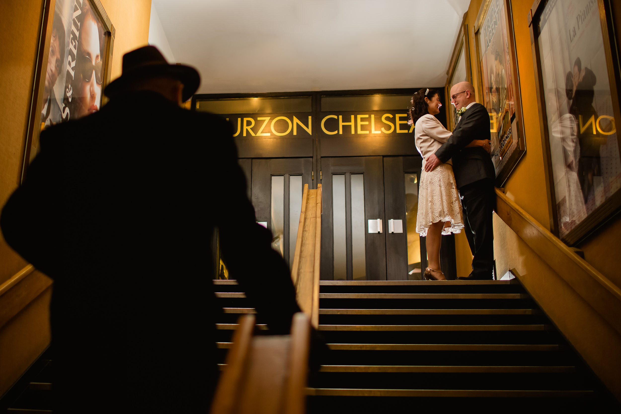 Bride and groom in a cinema chelsea London - Curzon london wedding - Kings road London wedding