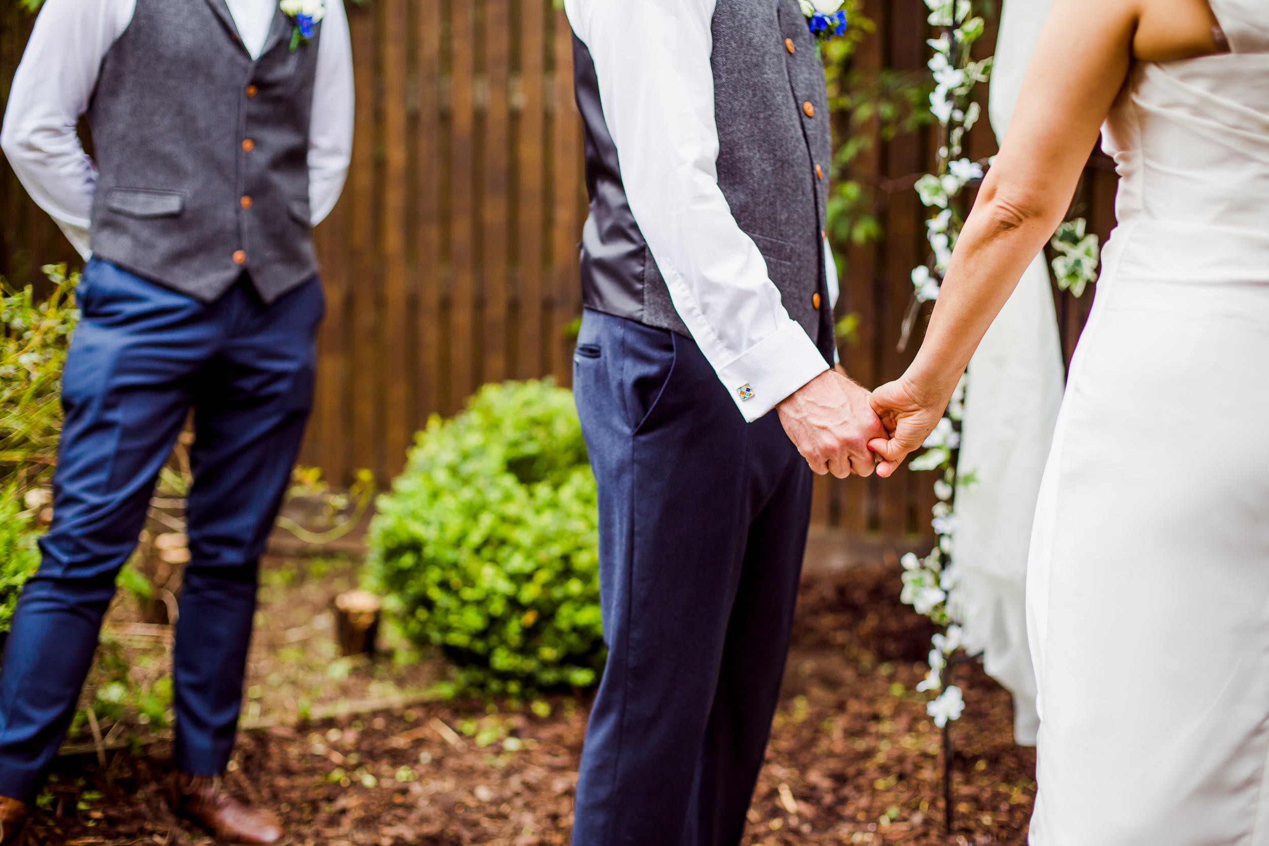 Back garden wedding - holding hands at a wedding - Yorkshire wedding 