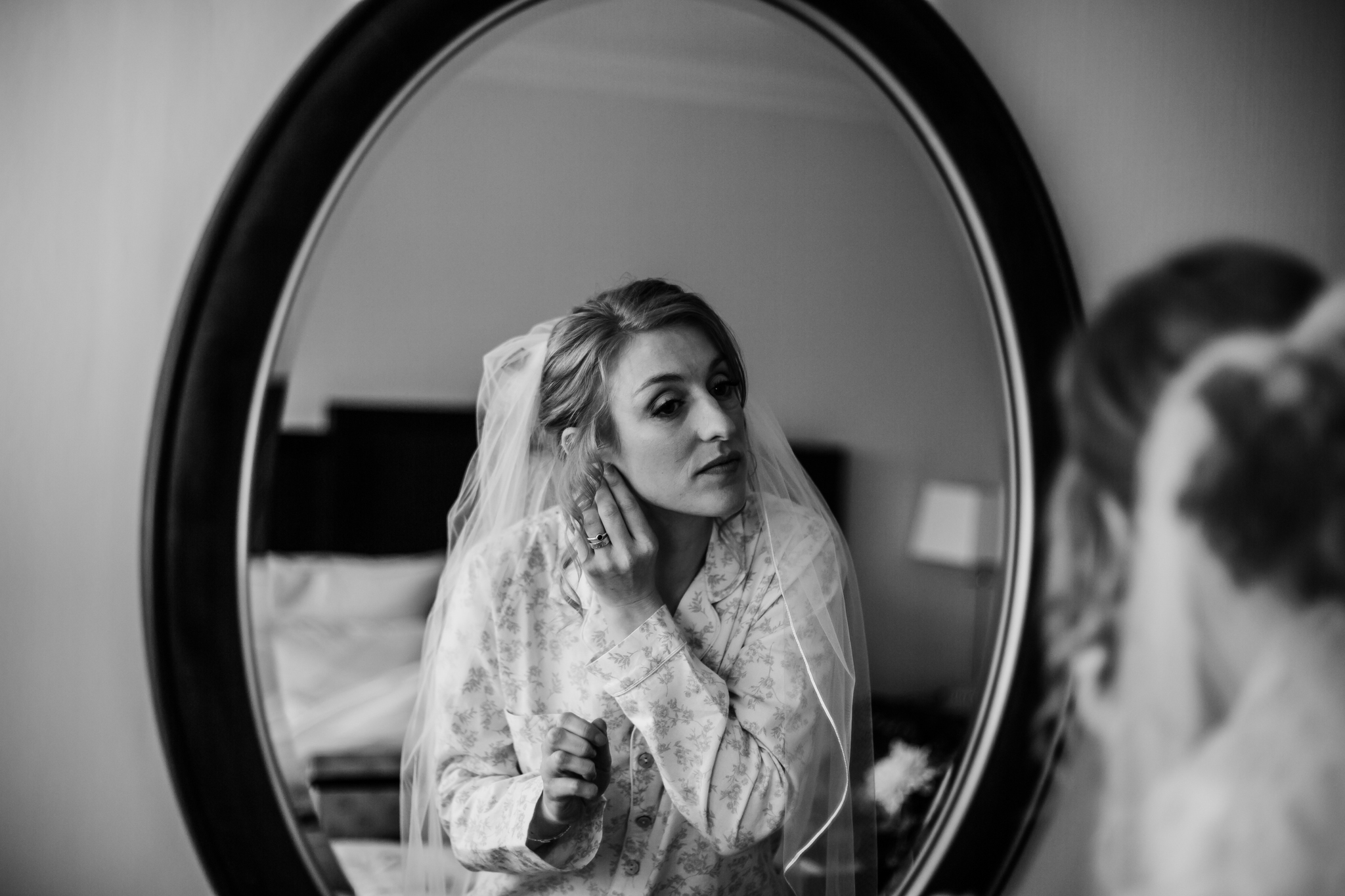 reflection of a bride getting ready