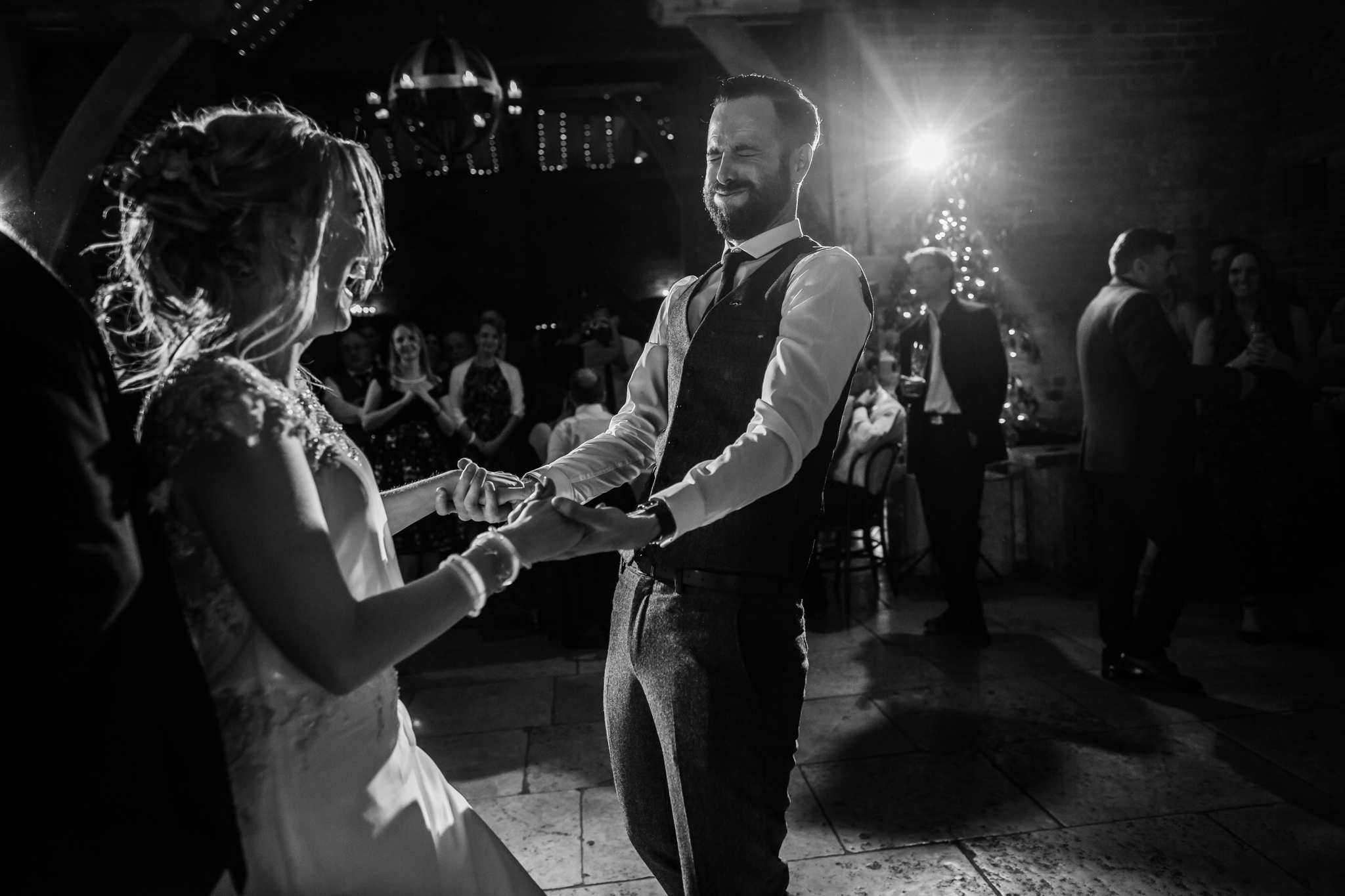 bride and groom dancing at shustoke barn