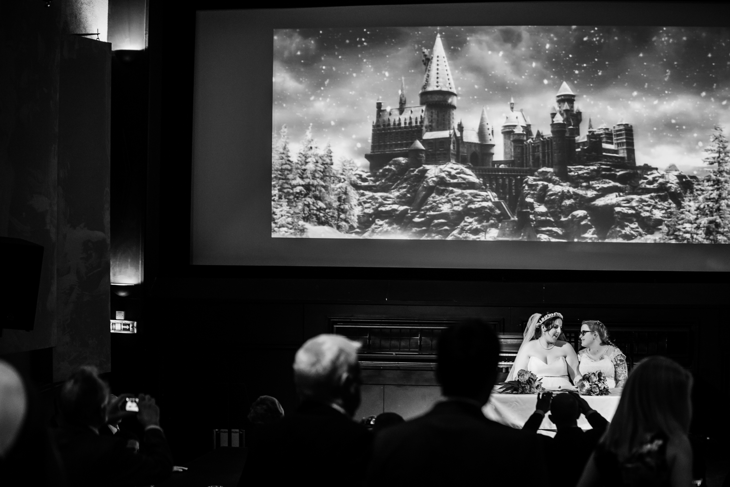 Signing of the register with Hogwarts in the background
