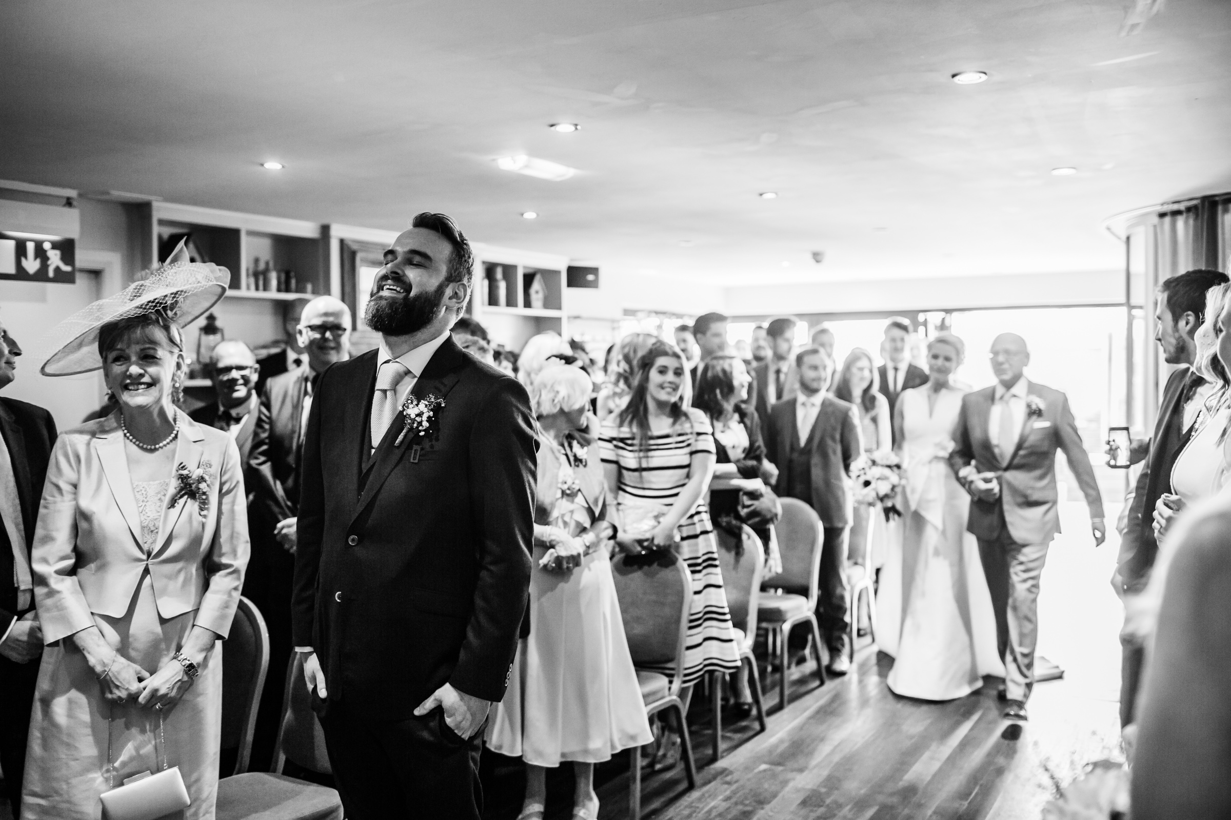 a nervous groom waits for his bride at great john street hotel manchester
